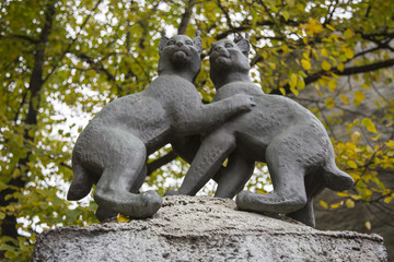 Fototapeta na wymiar Stone statues of animals in Moscow Zoo