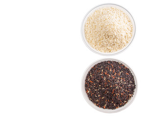 Black and white glutinous rice in bowl over white background