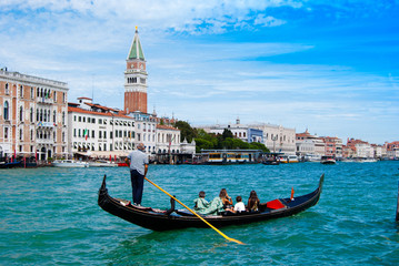 Obraz na płótnie Canvas Gondolas moored by Saint Mark square 