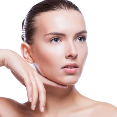 Fototapeta premium Beautiful face of young adult woman with clean fresh skin 