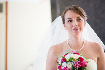 Bride holding beautiful wedding bouquet