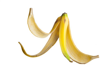 Banana peel floating on air against a white Background © Jose Luis Stephens
