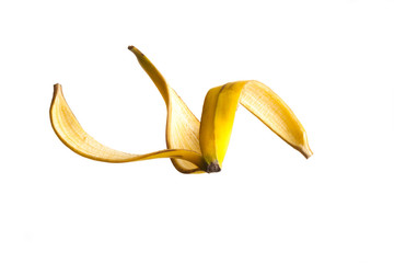 Banana peel floating on air against a white Background © Jose Luis Stephens