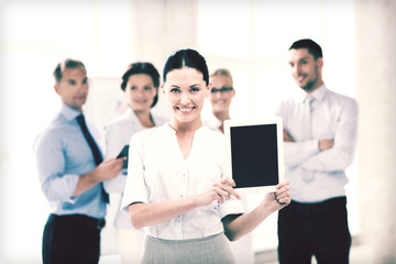 Fototapeta premium businesswoman with tablet pc in office