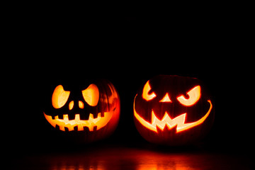 Scary Halloween pumpkins isolated on black