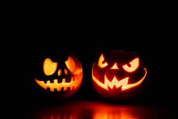 Scary Halloween pumpkins isolated on black