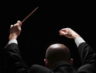 Concert conductor with a baton