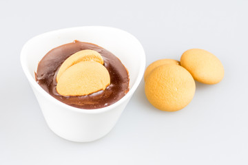 one cup of pudding with biscuits