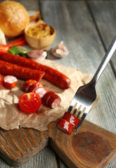 Smoked thin sausages and vegetables