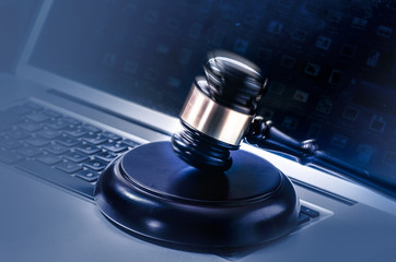 Gavel on computer legal law background