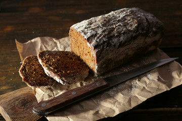 Sliced rye bread and knife