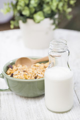 Breakfast of cornflakes, milk on the table