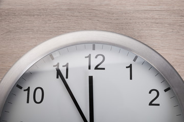 Obraz na płótnie Canvas Clock showing five before noon