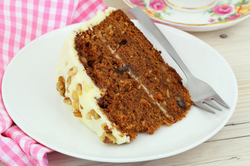 Carrot cake with walnuts and marzipan icing