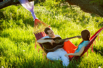 young couple relaxing in nature