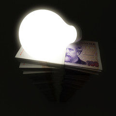 Argentine peso stack with shining lightbulb