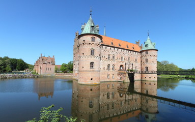 Naklejka na ściany i meble Egeskov castle, landmark fairy tale castle in Denmark