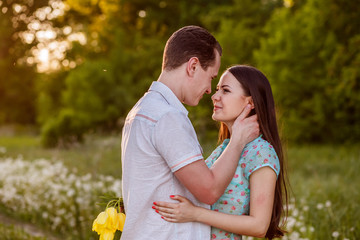 Fototapeta premium beautiful happy couple outdoors at sunset