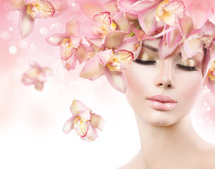 Fashion Beauty Model Girl with Orchid Flowers Hair