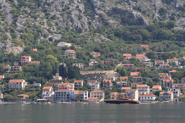 Fototapeta na wymiar View of the residential area of Kotor from the opposite shore