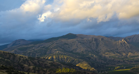 Fototapeta premium photo landscape of mountains with clouds and trees