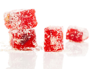 Sweet pieces of turkish delight on white background