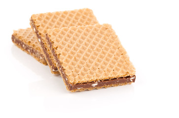 Wafers with chocolate on a white background