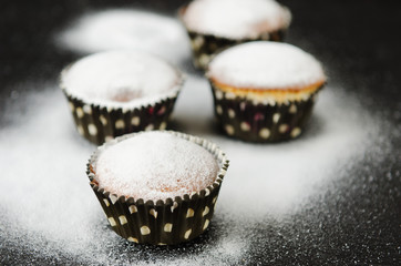 muffins in powdered sugar
