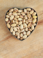 Pistachio nuts in heart shape