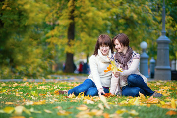 Middle aged woman with daughter on a fall day