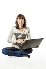 Young woman holding laptop