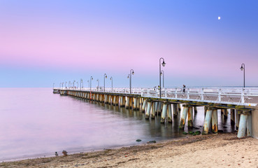 Fototapeta premium Baltic pier in Gdynia Orlowo at sunset, Poland