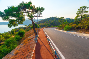 good asphalt road in the mountains near the sea