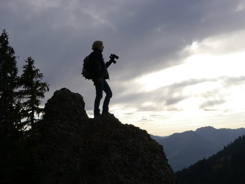 woman binoculars mountain