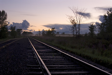 Railroad Tracks with Sunset