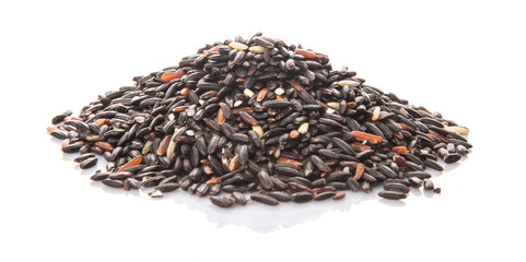 Black glutinous rice over white background