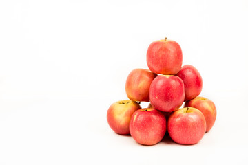 Organic red apples isolated on white