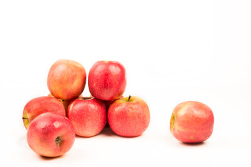 Organic red apples isolated on white