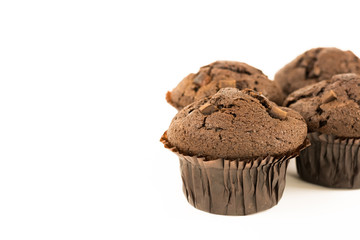 Organic chocolate muffins isolated on white