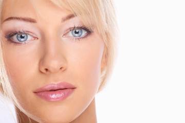 Obraz premium Close up portrait of beautiful young woman face. Isolated on