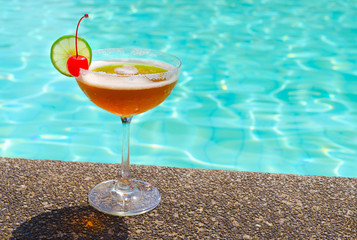 Cocktails near the swimming pool on summer