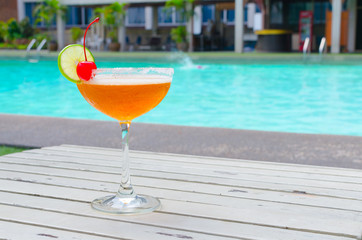 Cocktails near the swimming pool on summer