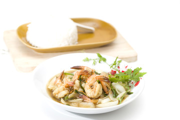 Close up fried shrimp in pepper and garlic sauce and rice