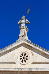 Fototapeta na wymiar Venetian architecture and detail of church facade in Perast