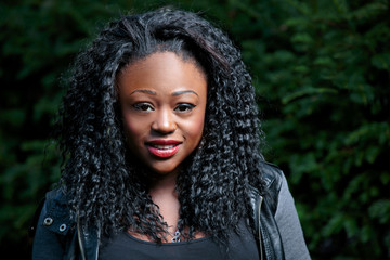 Smiling Young Black Curly Woman