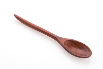 Wooden spoon isolated on white background