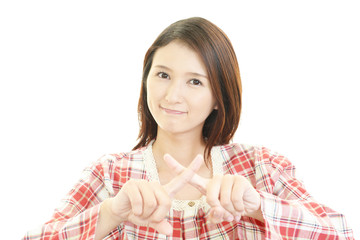禁止の意思表示をする女性