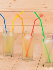 Three collins full of tasty cold lemonade.
