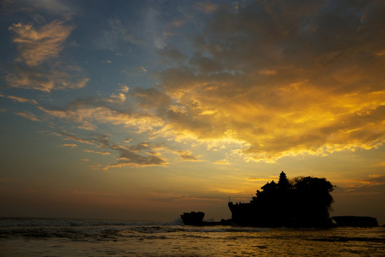 Tanah Lot and sea waves on sunset, Bali, Indonesia