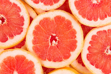 Close up of fresh sliced grapefruits.